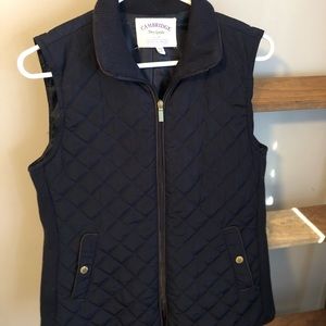 Navy blue quilted vest.